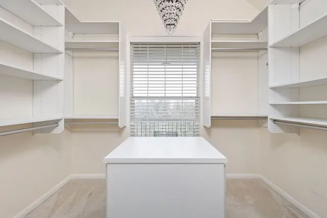 a bathroom with double vanity sinks and a mirror