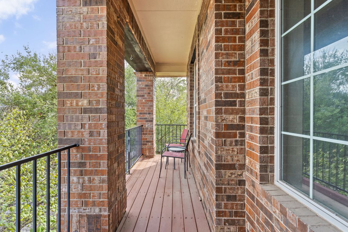 7109 Via Correto Drive Austin, TX 78749 - Photo 25 of 40 a view of a balcony with wooden floor