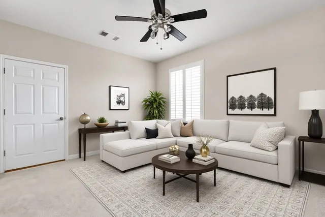 a dining room with furniture a chandelier and glass door