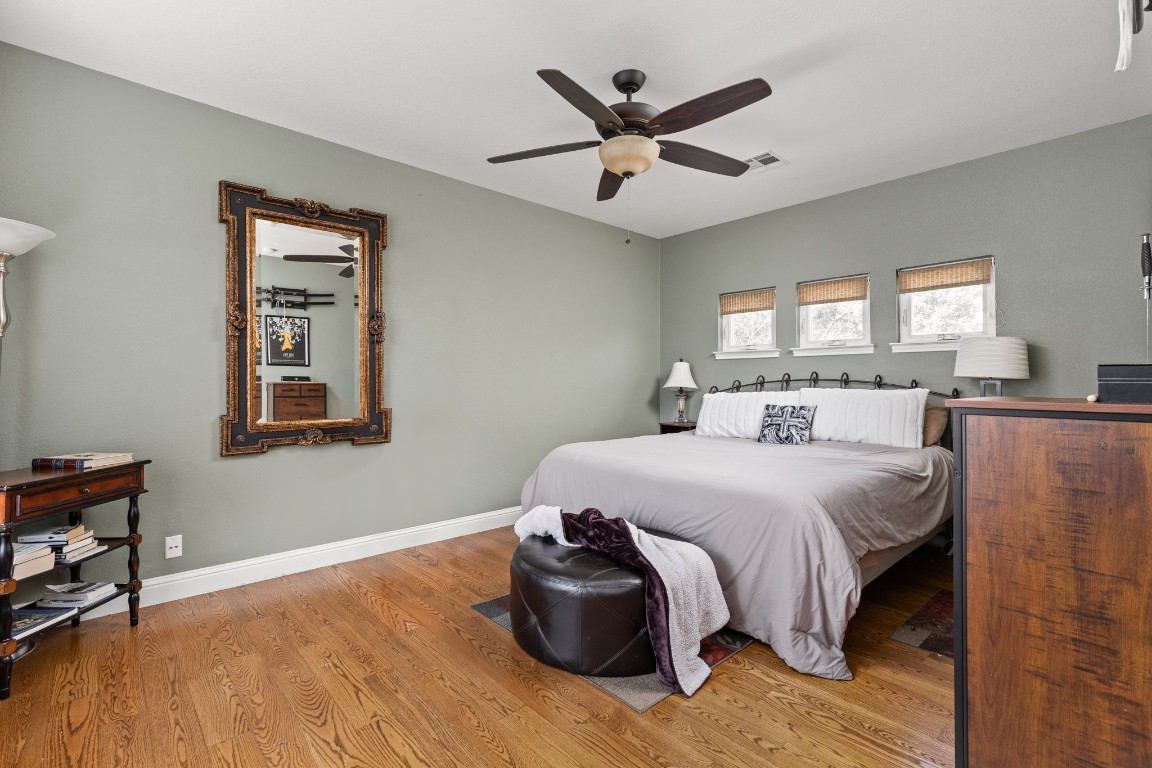 7109 Via Correto Drive Austin, TX 78749 - Photo 30 of 40 a bedroom with a large bed and a window
