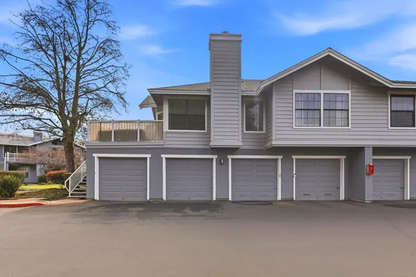 front view of a house with a street