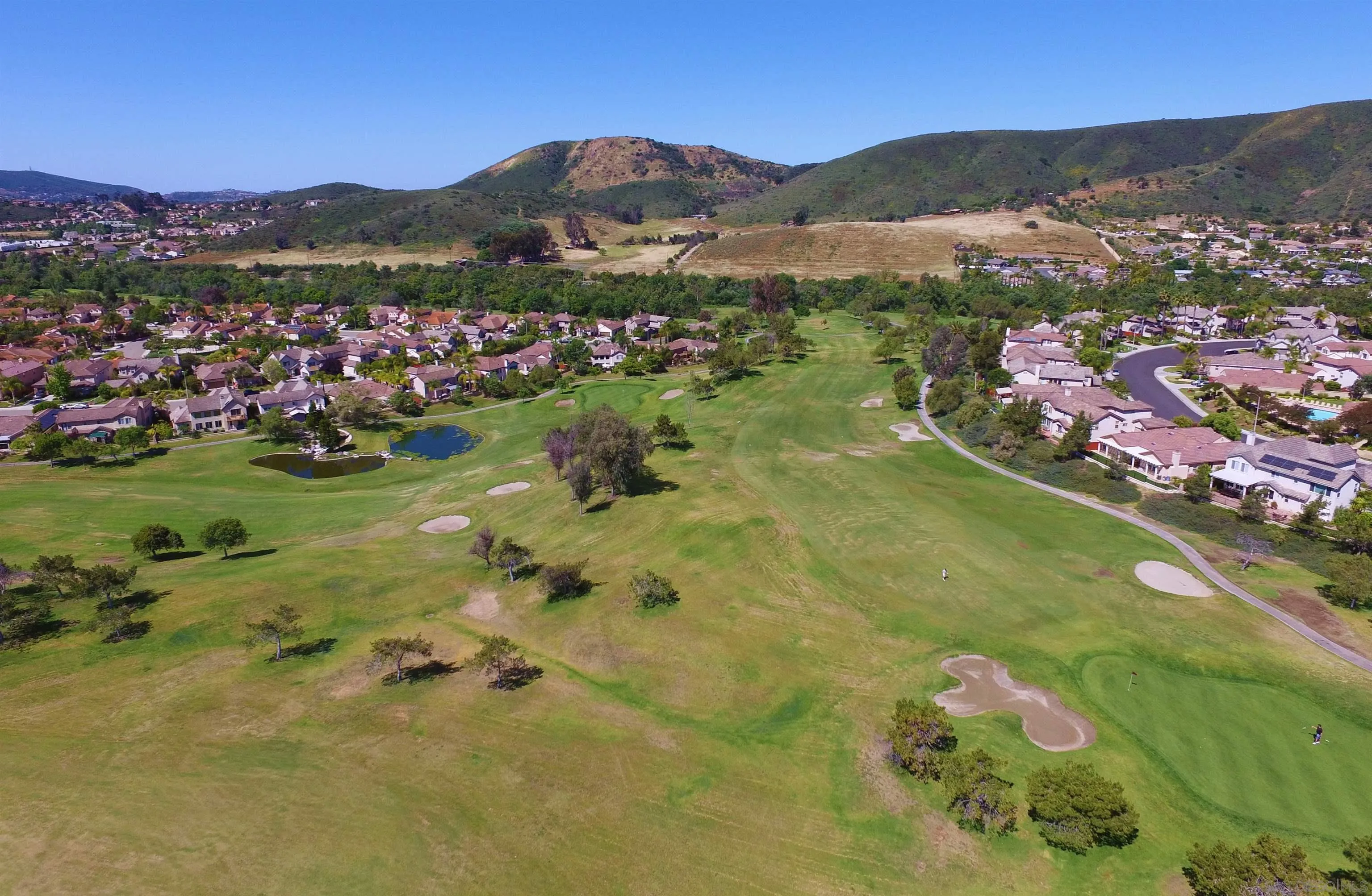 1783 Medinah Road San Marcos, CA 92069 - Photo 39 of 39 a view of a town with mountains in the background