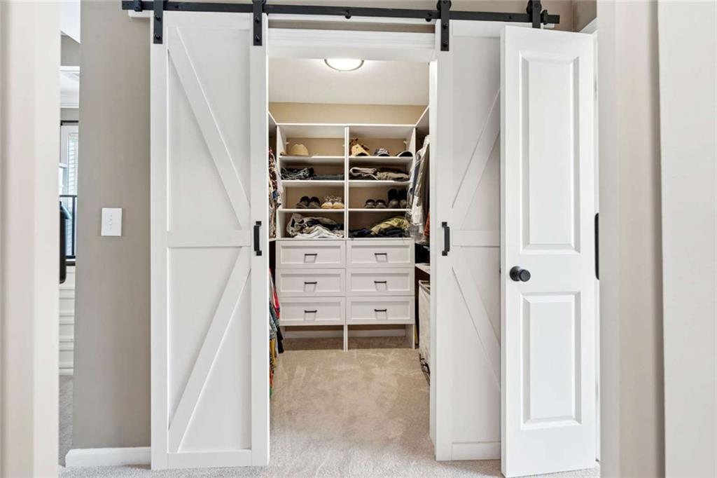4510 Trailmaster Circle Cumming, GA 30028 - Photo 27 of 49 a view of walk in closet