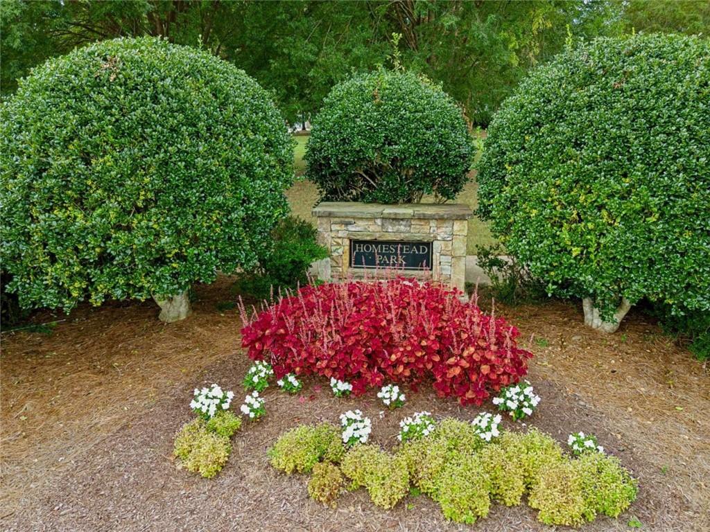 4510 Trailmaster Circle Cumming, GA 30028 - Photo 39 of 49 a view of a garden with flowers