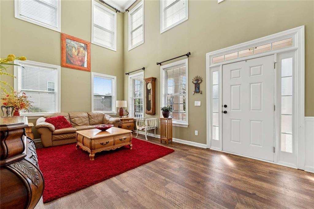 4510 Trailmaster Circle Cumming, GA 30028 - Photo 4 of 49 a living room with furniture and a window