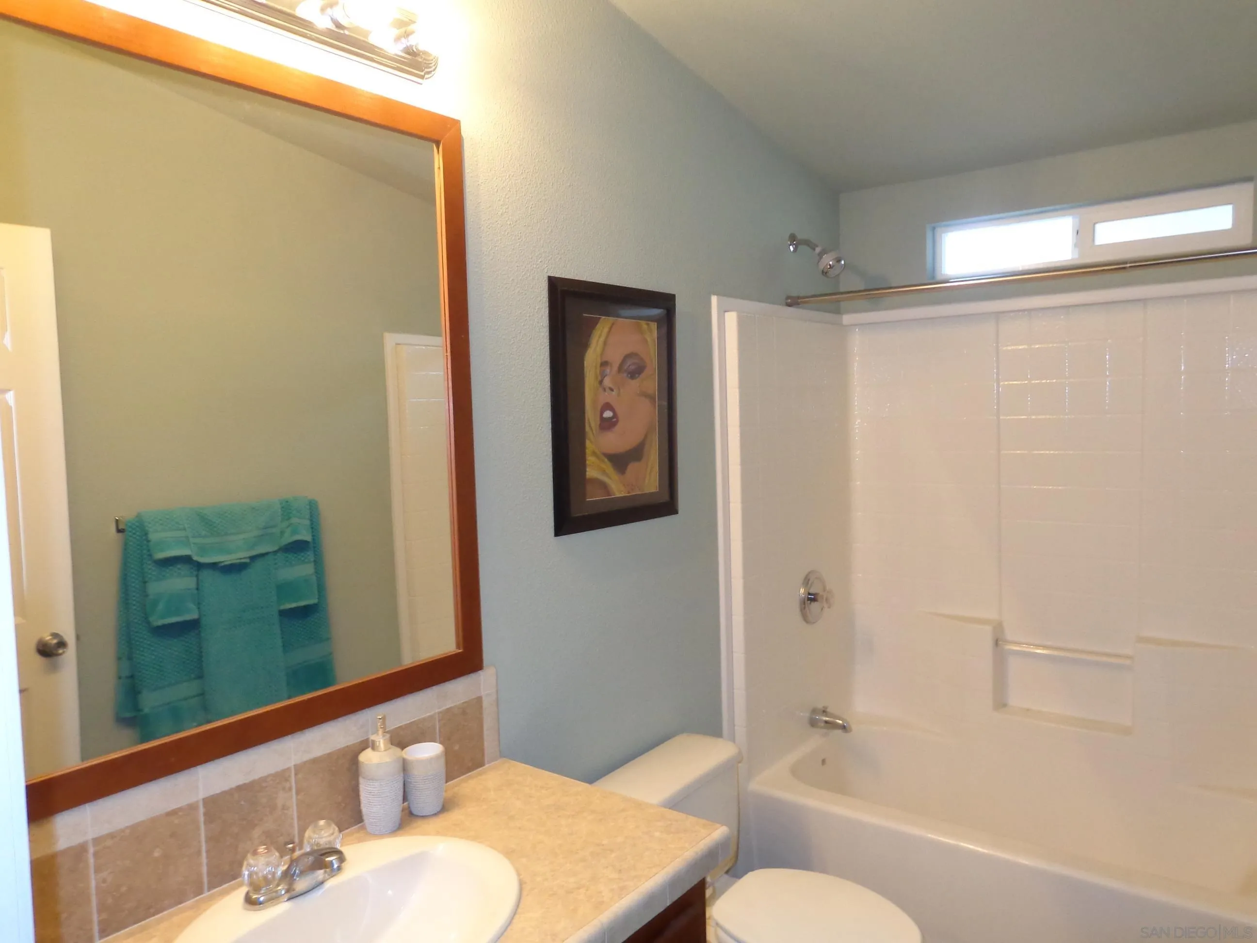 43 Havenview Lane Oceanside, CA 92056 - Photo 19 of 24 a bathroom with a granite countertop sink toilet and shower