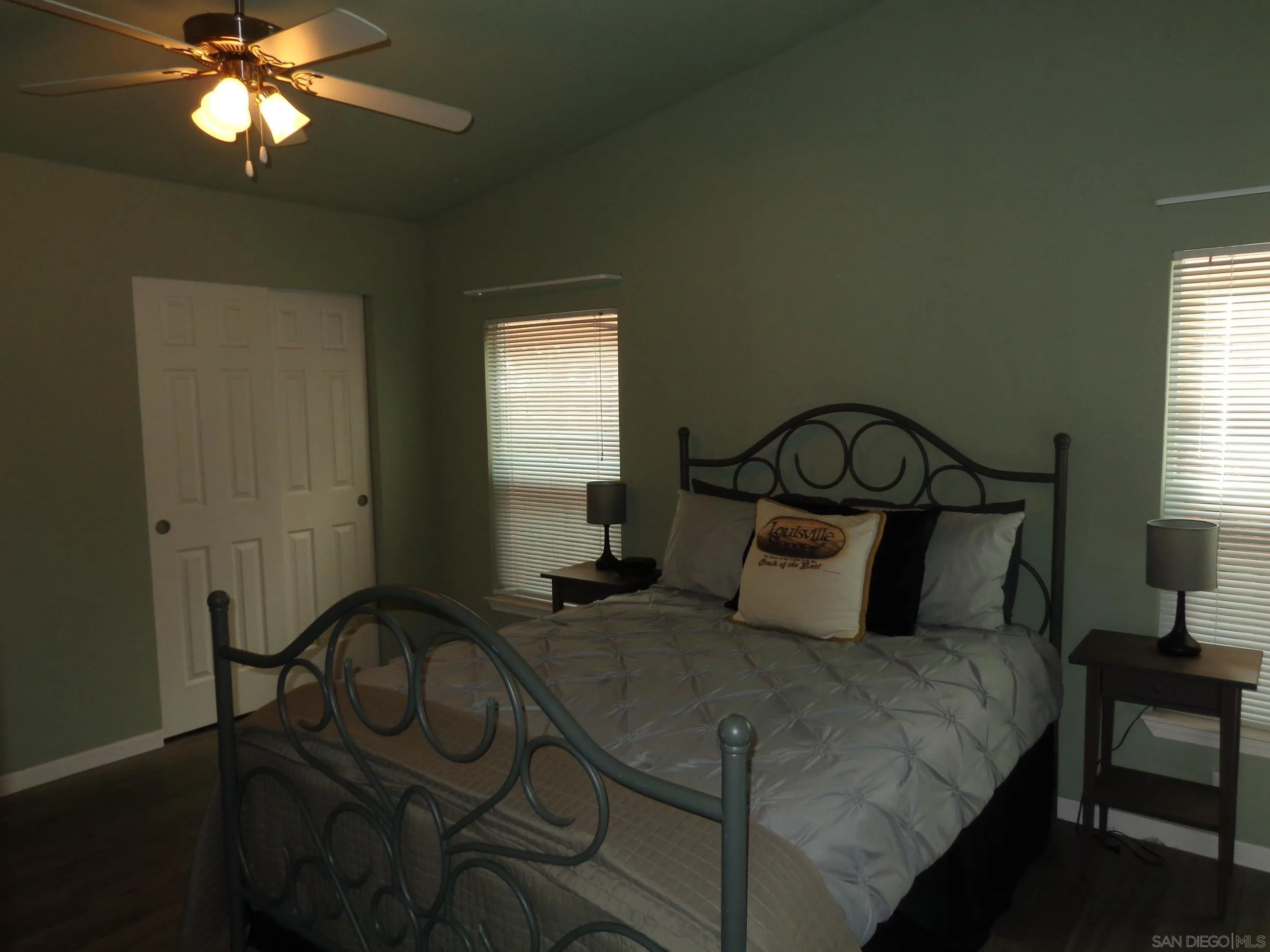 43 Havenview Lane Oceanside, CA 92056 - Photo 20 of 24 a bedroom with a bed and a chandelier