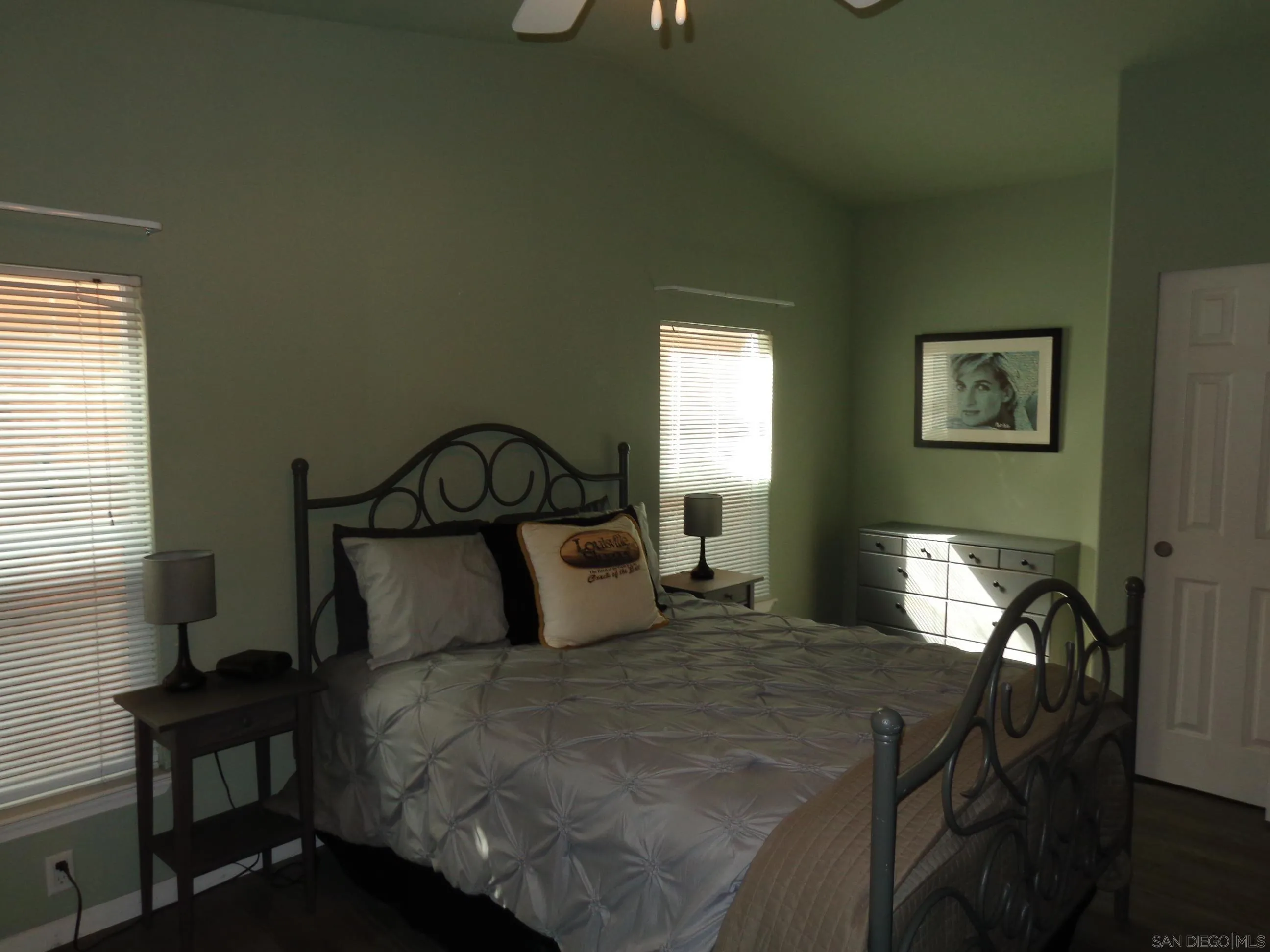 43 Havenview Lane Oceanside, CA 92056 - Photo 22 of 24 a bedroom with a bed and a window