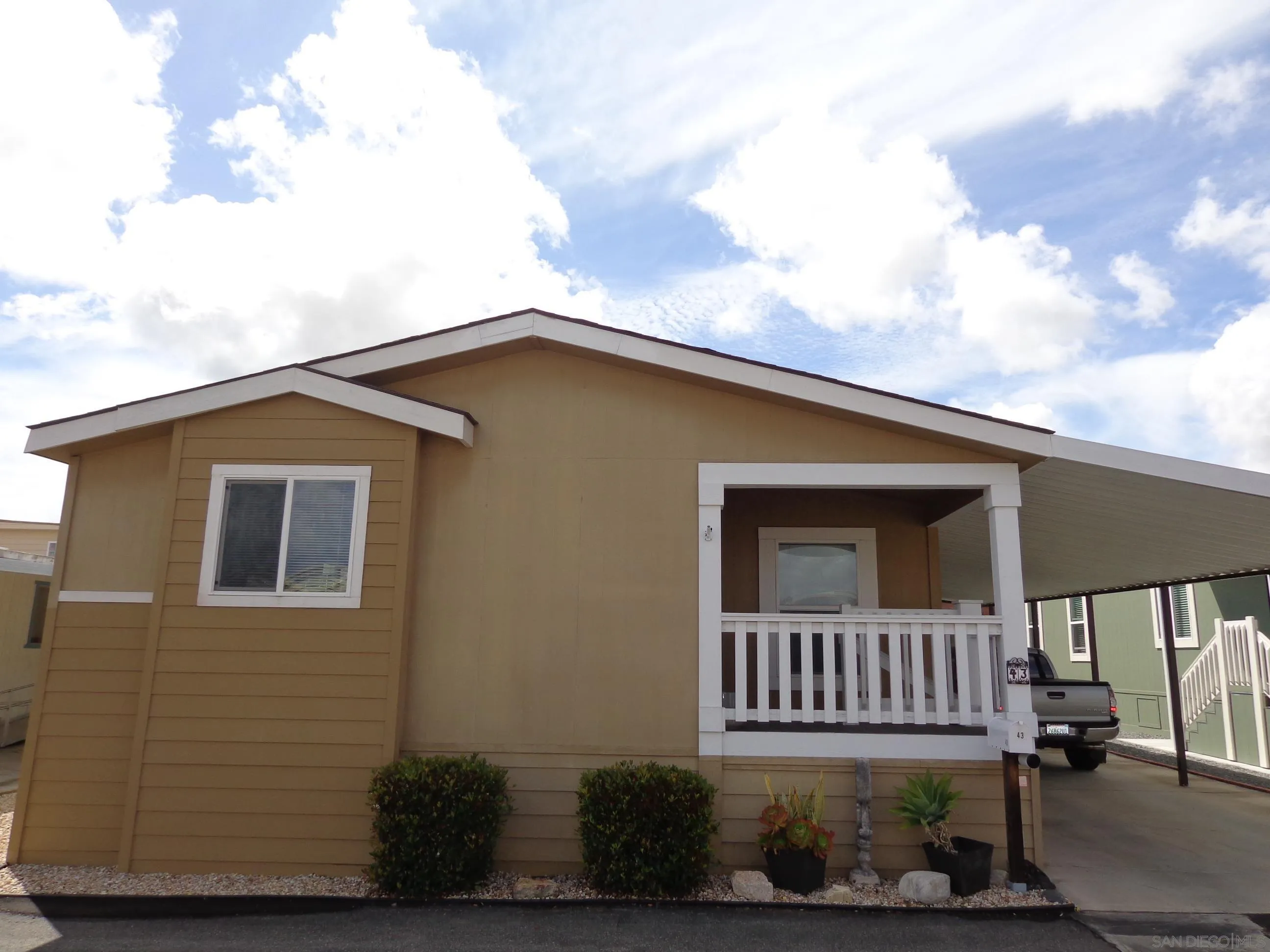 43 Havenview Lane Oceanside, CA 92056 - Photo 3 of 24 a view of a house with a small yard