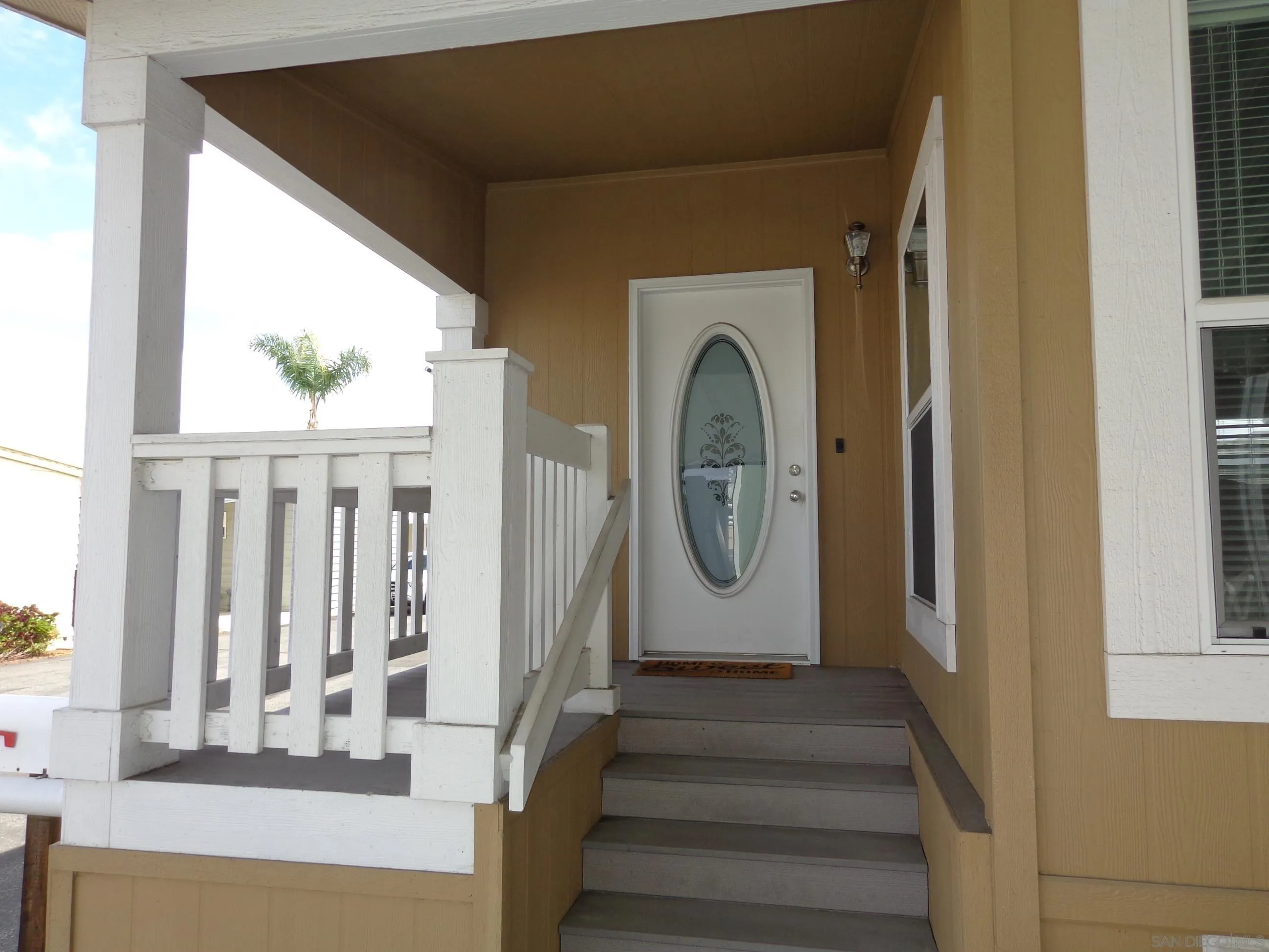 43 Havenview Lane Oceanside, CA 92056 - Photo 4 of 24 a view of a entryway door with wooden floor