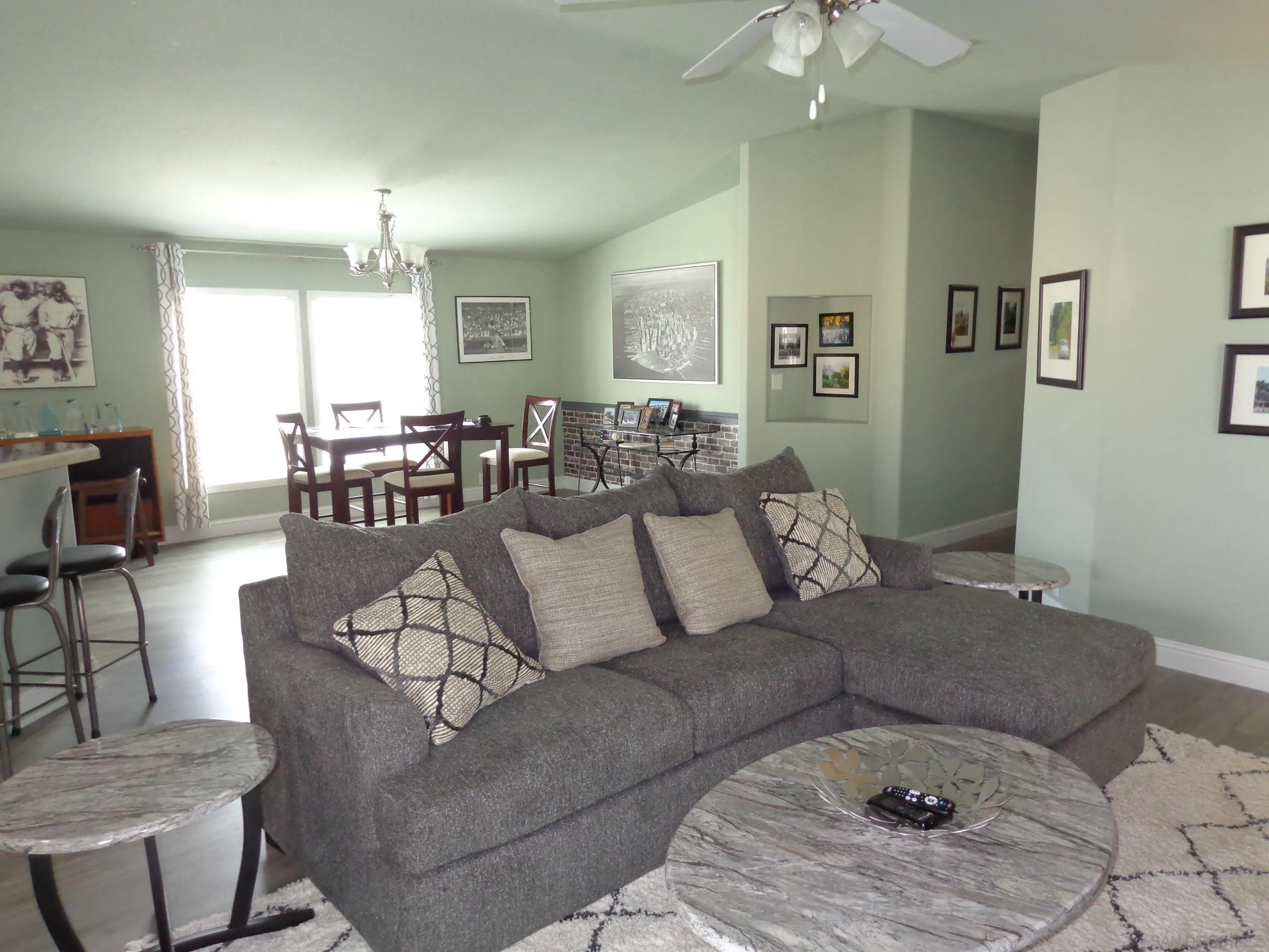 43 Havenview Lane Oceanside, CA 92056 - Photo 9 of 24 a living room with furniture and a chandelier
