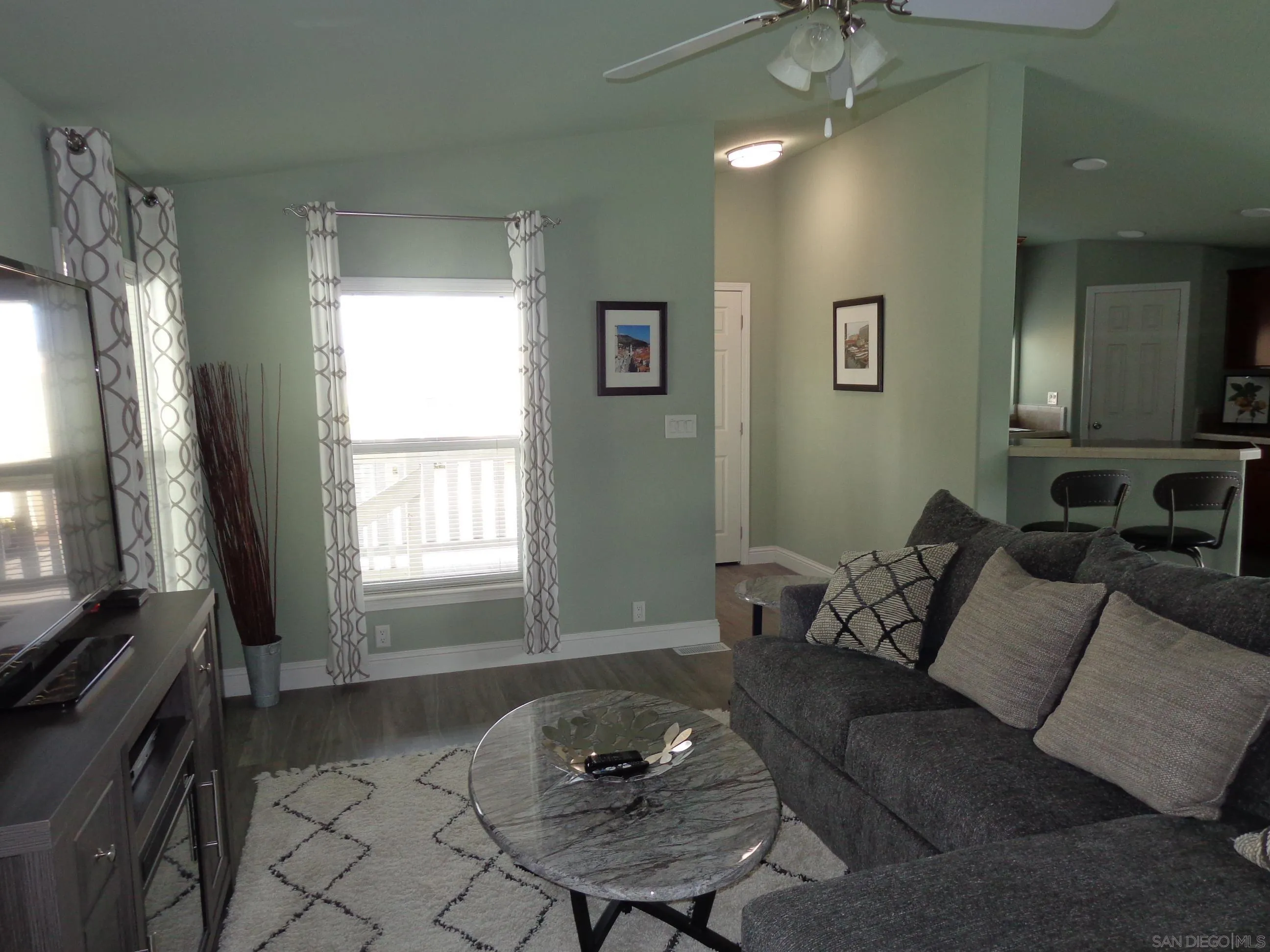 43 Havenview Lane Oceanside, CA 92056 - Photo 10 of 24 a living room with furniture and a flat screen tv