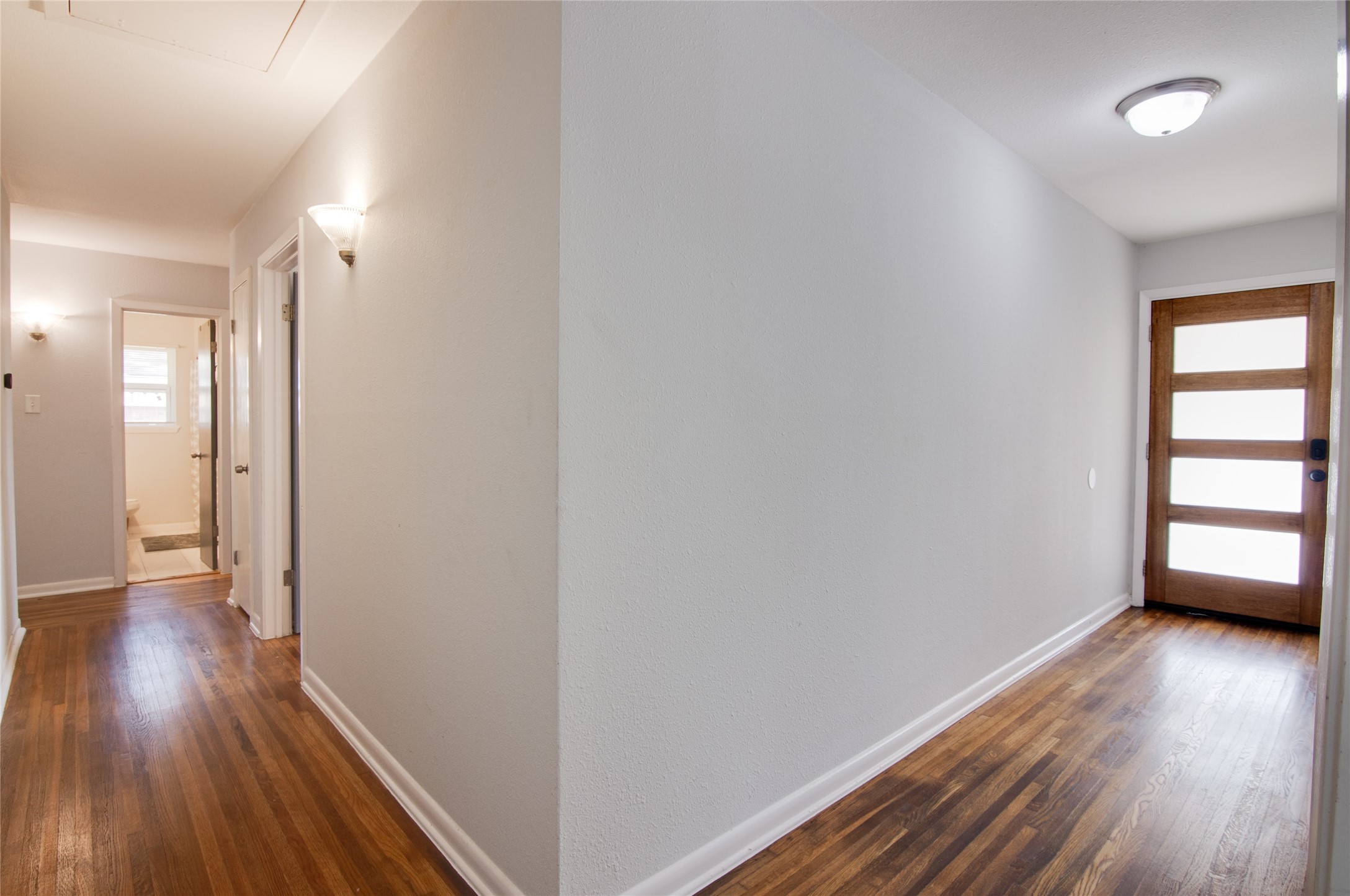8922 Opelika Street Houston, TX 77080 - Photo 16 of 23 a view of a room with wooden floor and a window