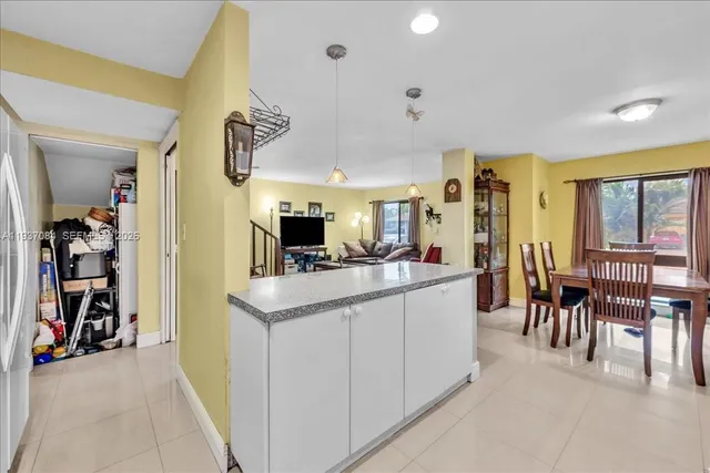 a view of a living room and dining room