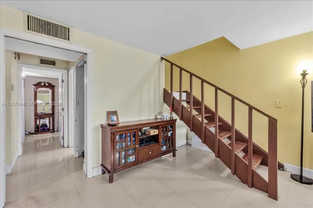 a view of an entryway with staircase