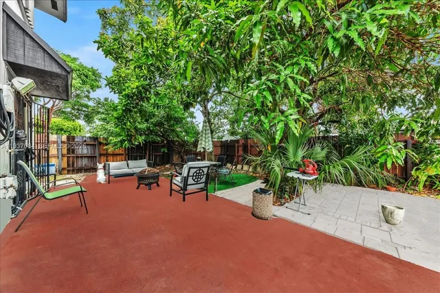 a view of a park with swings and slides