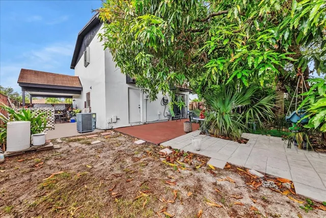 a view of a backyard of a house
