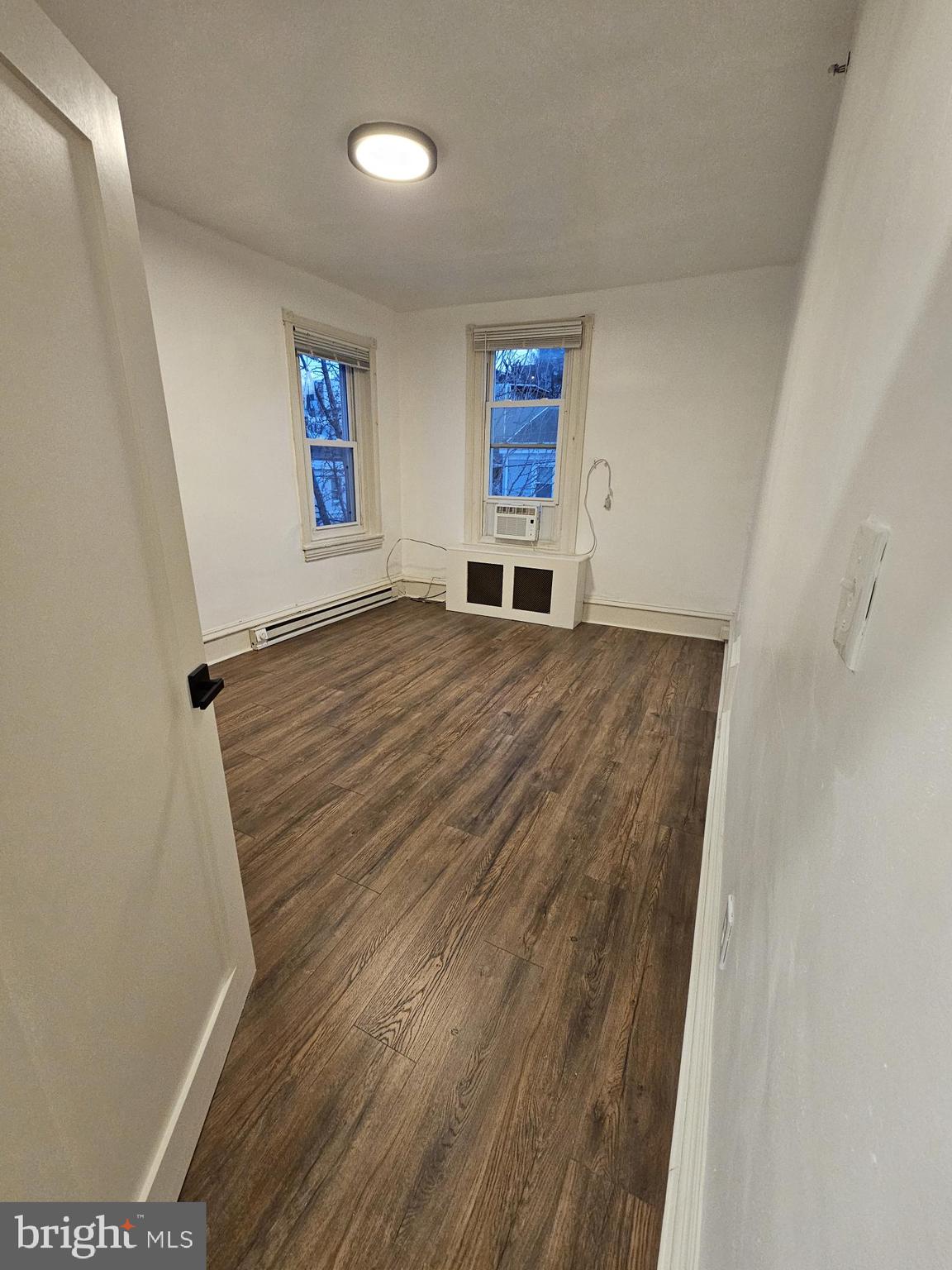3922 Terrace Street, Unit 3 Philadelphia, PA 19128 - Photo 7 of 10 a view of empty room with wooden floor