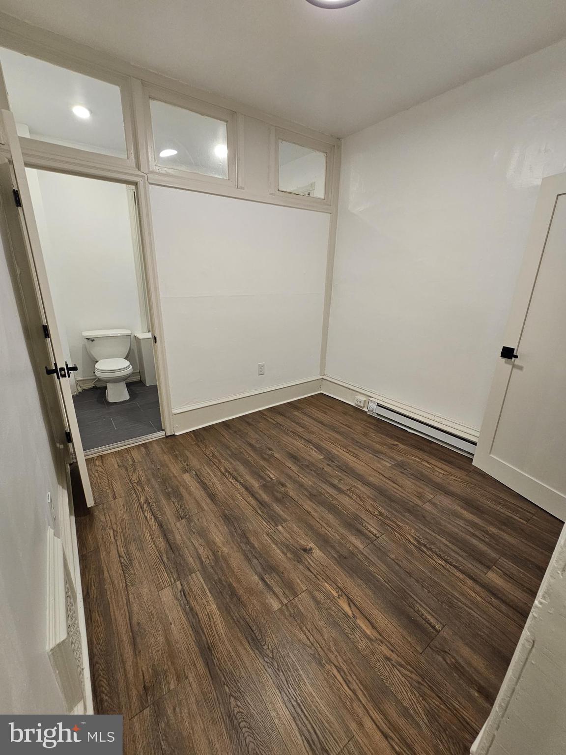 3922 Terrace Street, Unit 3 Philadelphia, PA 19128 - Photo 8 of 10 a view of empty room with wooden floor