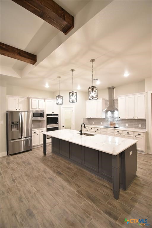 Tbd Tbd River Belton, TX 76513 - Photo 7 of 14 a kitchen with kitchen island stainless steel appliances a sink stove and refrigerator