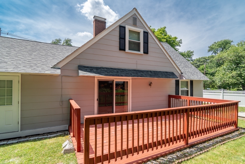 79 Mill Street Natick, MA 01760 - Photo 17 of 21 a front view of a house with a porch