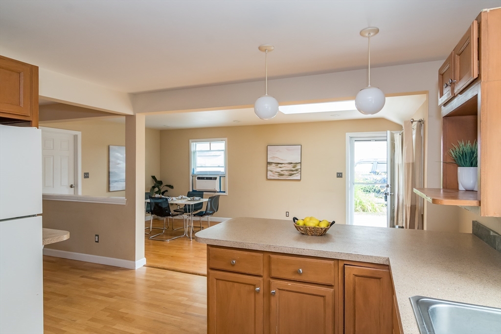 79 Mill Street Natick, MA 01760 - Photo 5 of 21 a kitchen with a counter space cabinets and appliances