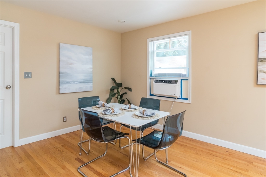 79 Mill Street Natick, MA 01760 - Photo 6 of 21 a view of a dining room with furniture and window