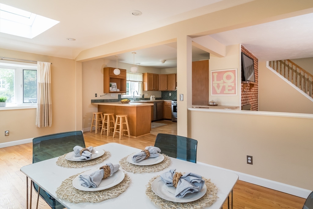 79 Mill Street Natick, MA 01760 - Photo 7 of 21 a living room with furniture and a wooden floor
