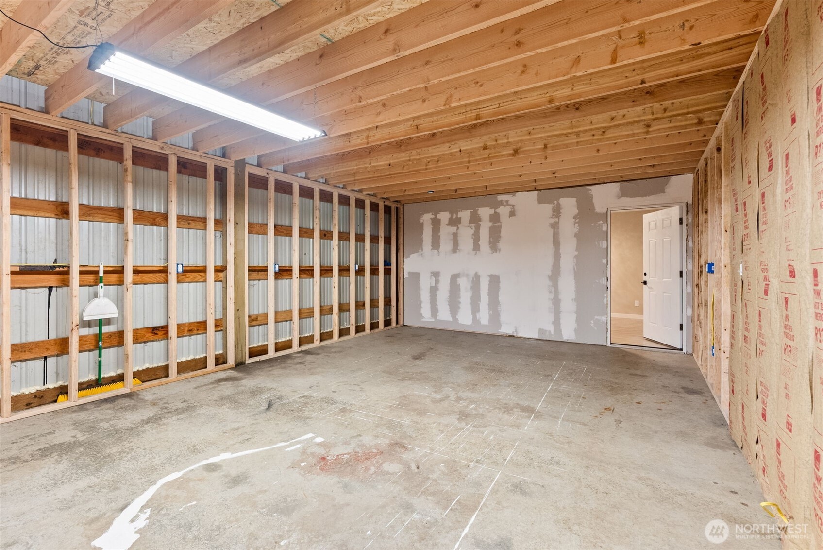 269 Elk Creek Road Raymond, WA 98577 - Photo 34 of 38 a view of a room with a garage