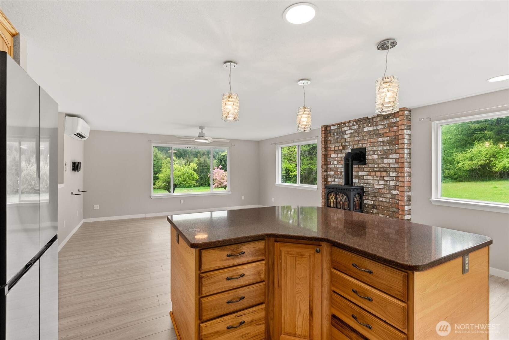 269 Elk Creek Road Raymond, WA 98577 - Photo 8 of 38 a kitchen with stainless steel appliances granite countertop a sink a counter space and windows