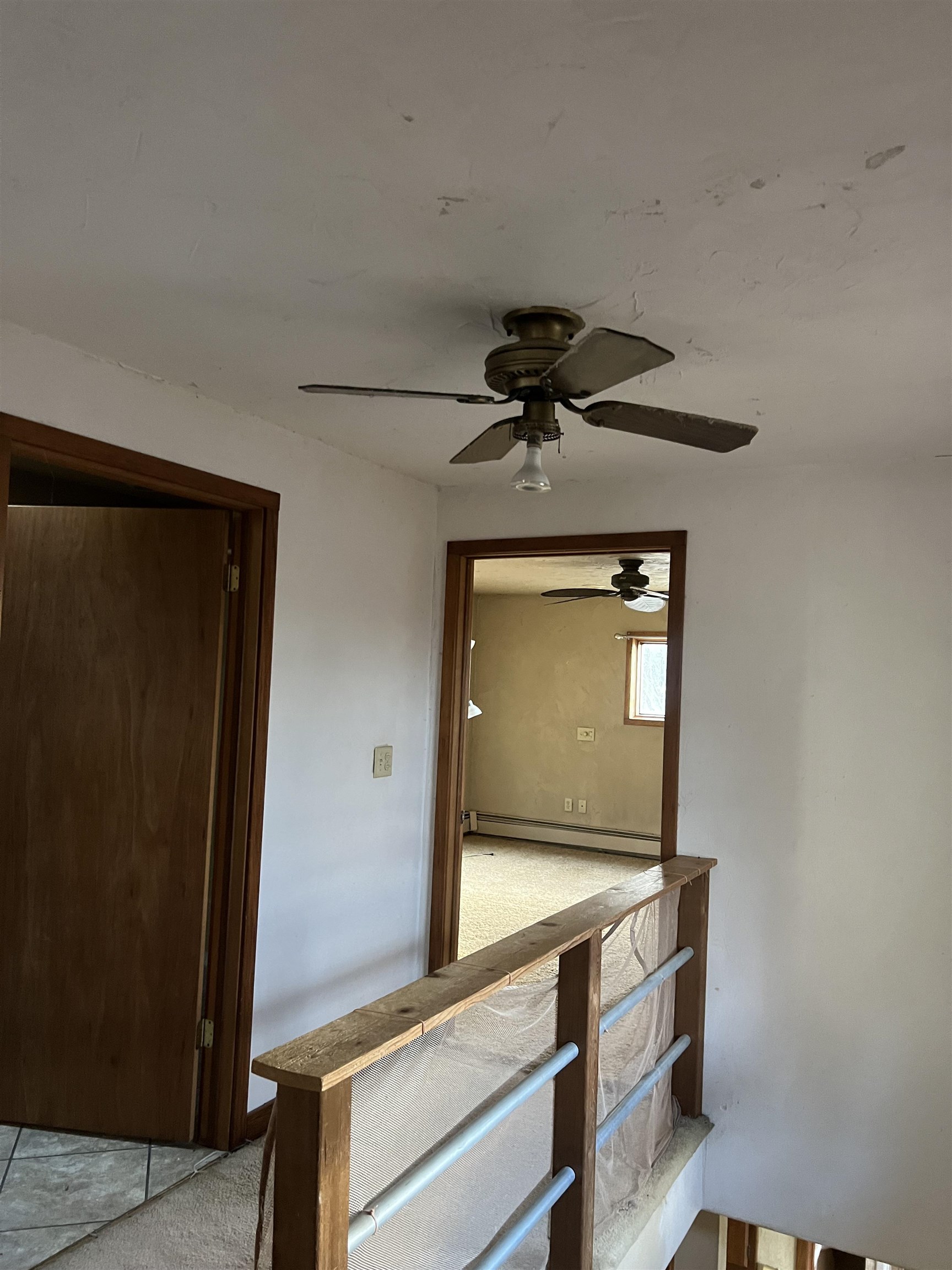 4304 West Lily Creek Road Freeport, IL 61032 - Photo 21 of 43 a room with a bed and a mirror