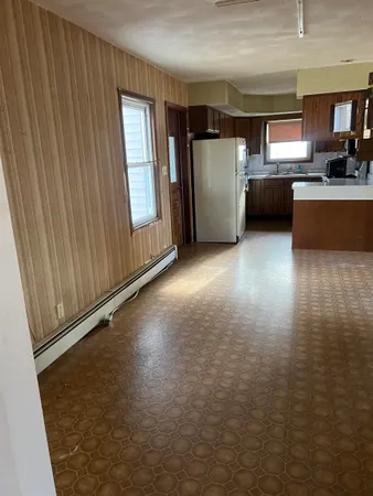 a view of kitchen and windows