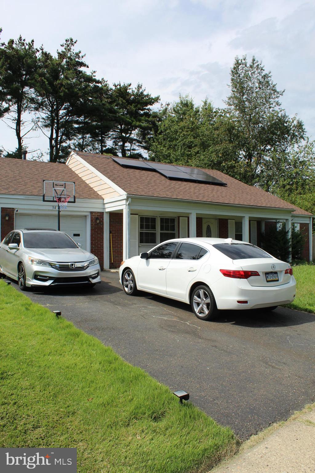 34 Garrison Circle Willingboro, NJ 08046 - Photo 3 of 14 a car parked in front of a house