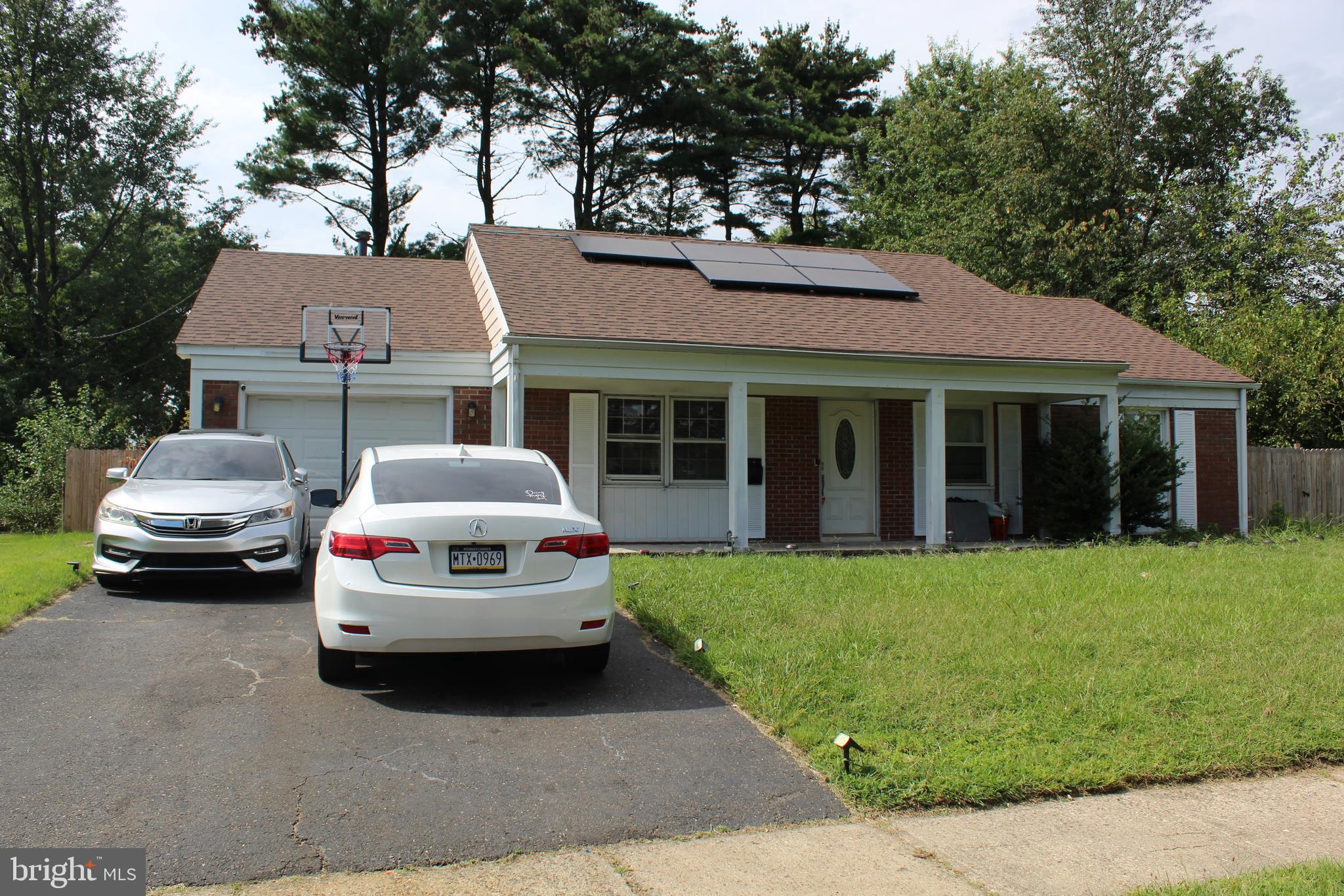 34 Garrison Circle Willingboro, NJ 08046 - Photo 4 of 14 a car parked in front of a house