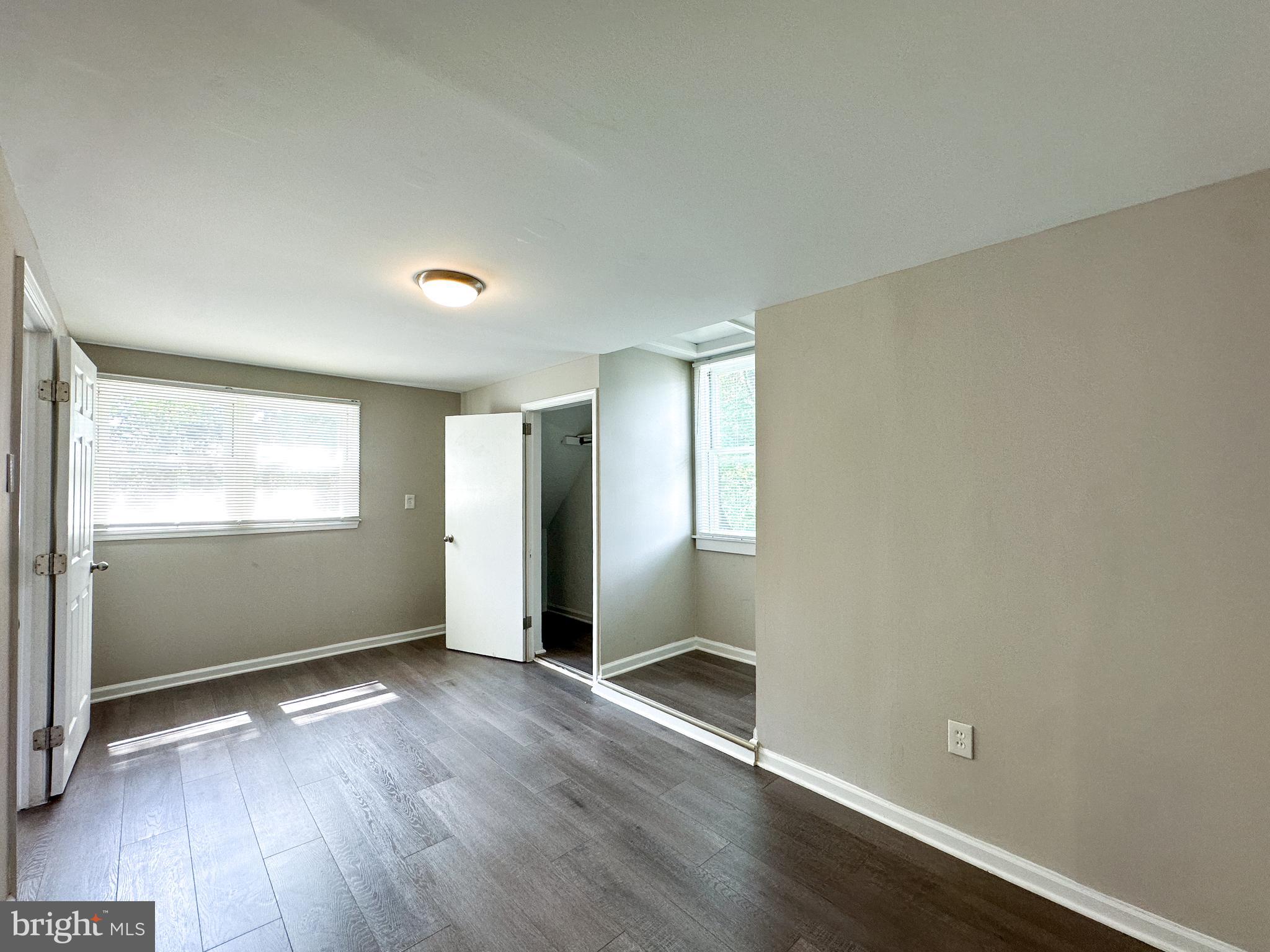 2191 Dunks Ferry Road Bensalem, PA 19020 - Photo 24 of 33 an empty room with wooden floor and windows