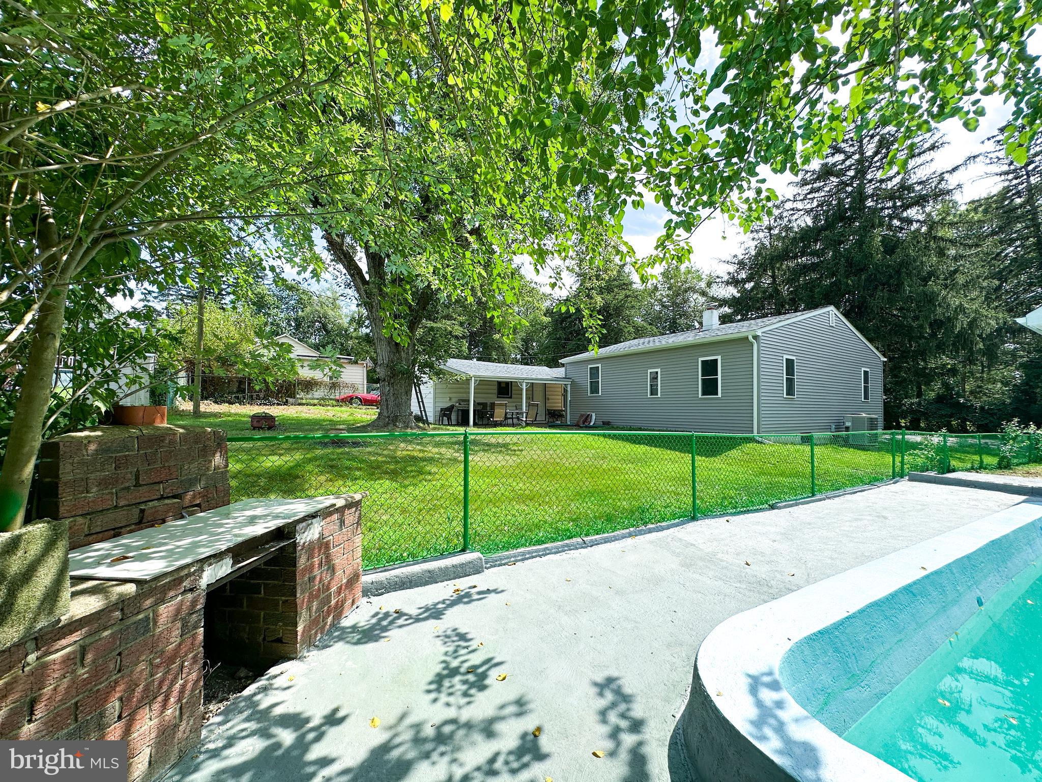 2191 Dunks Ferry Road Bensalem, PA 19020 - Photo 6 of 33 a view of a house with backyard and sitting area