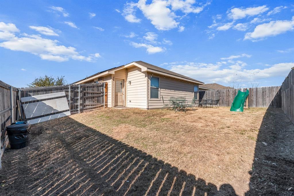 9000 Quarry Ridge Trail Fort Worth, TX 76244 - Photo 25 of 32 a view of backyard of a house