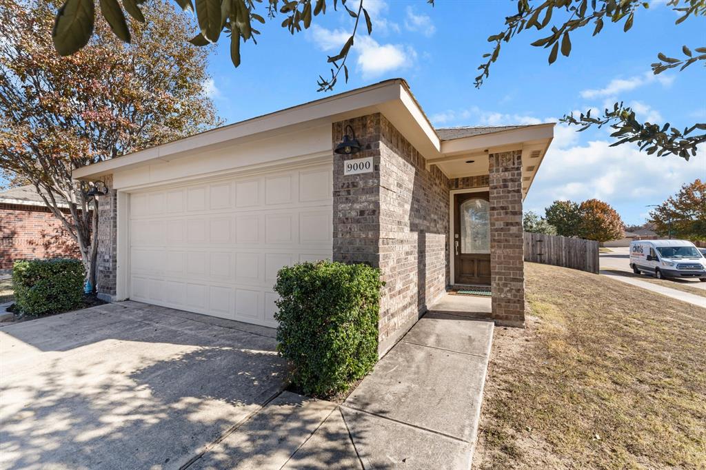 9000 Quarry Ridge Trail Fort Worth, TX 76244 - Photo 29 of 32 a front view of a house with garden