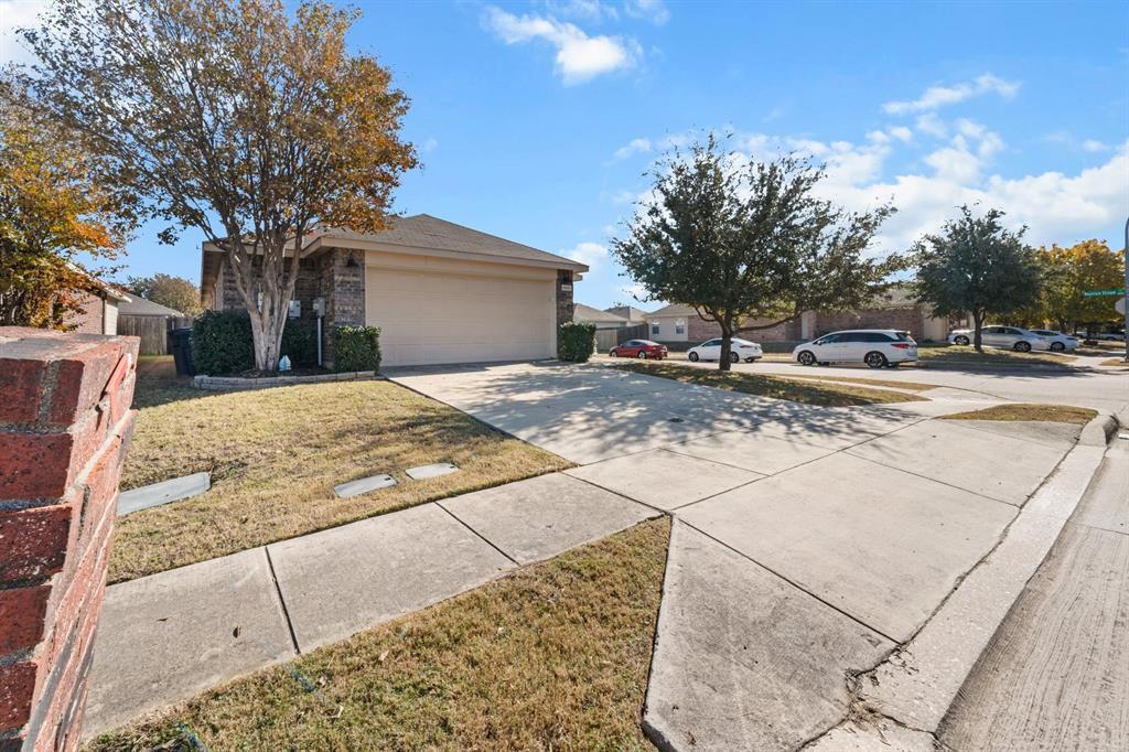 9000 Quarry Ridge Trail Fort Worth, TX 76244 - Photo 31 of 32 a view of a yard and front view of a house