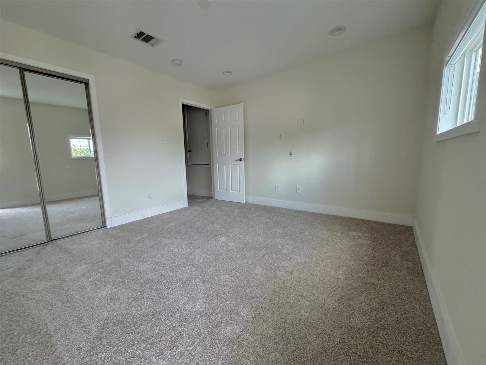 935 La Posada Drive, Unit 252 Austin, TX 78752 - Photo 15 of 20 an empty room with windows
