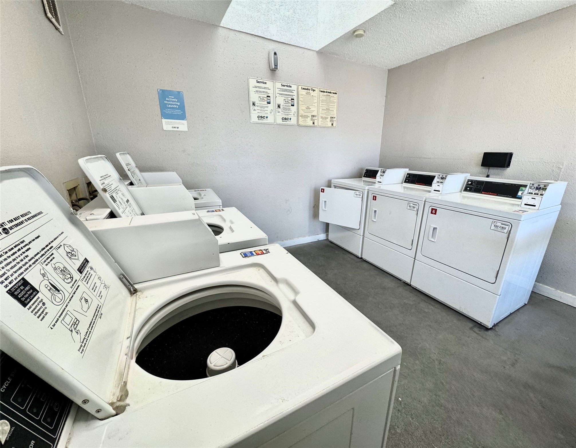 935 La Posada Drive, Unit 252 Austin, TX 78752 - Photo 17 of 20 a utility room with dryer and washer