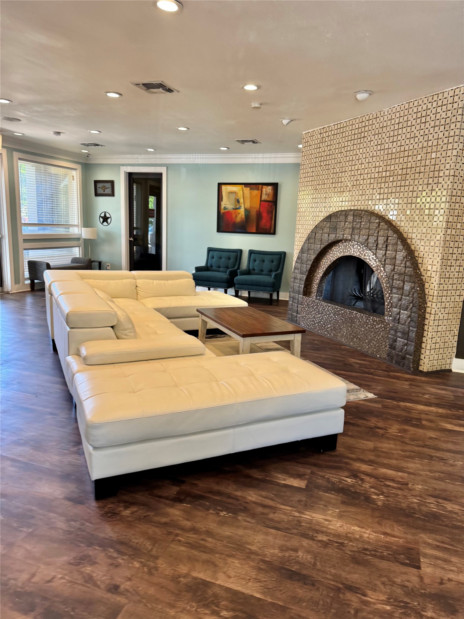 935 La Posada Drive, Unit 252 Austin, TX 78752 - Photo 20 of 20 a living room with furniture and a fireplace