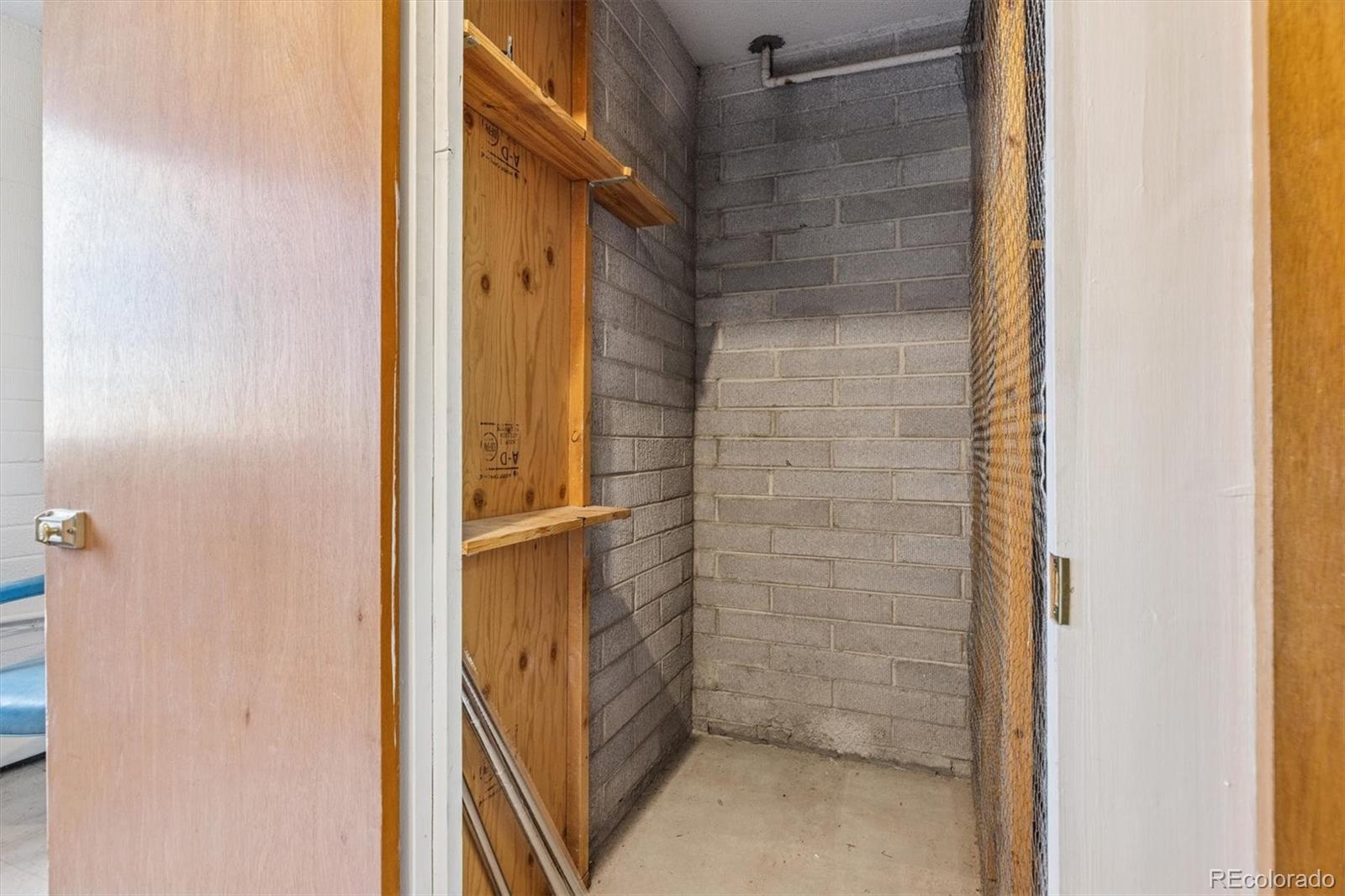 350 South Clinton Street, Unit 8B Denver, CO 80247 - Photo 17 of 50 a bathroom with a shower