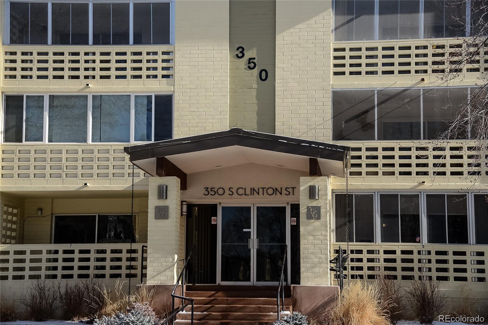 350 South Clinton Street, Unit 8B Denver, CO 80247 - Photo 20 of 50 front view of a brick building