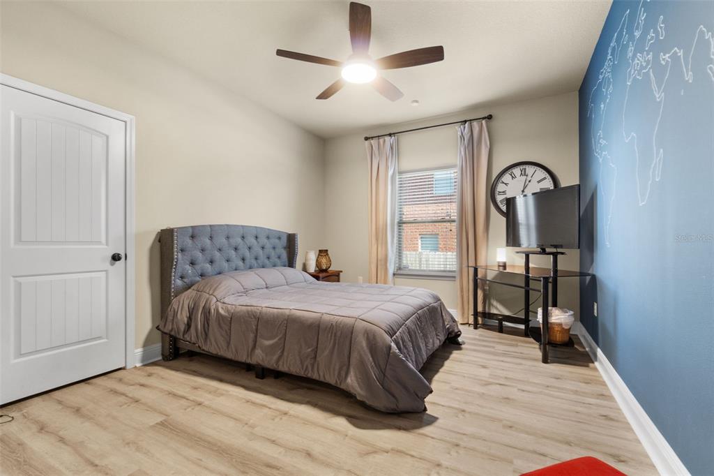 5973 Rustic Ridge Circle Milton, FL 32570 - Photo 9 of 44 a bedroom with a bed and a window