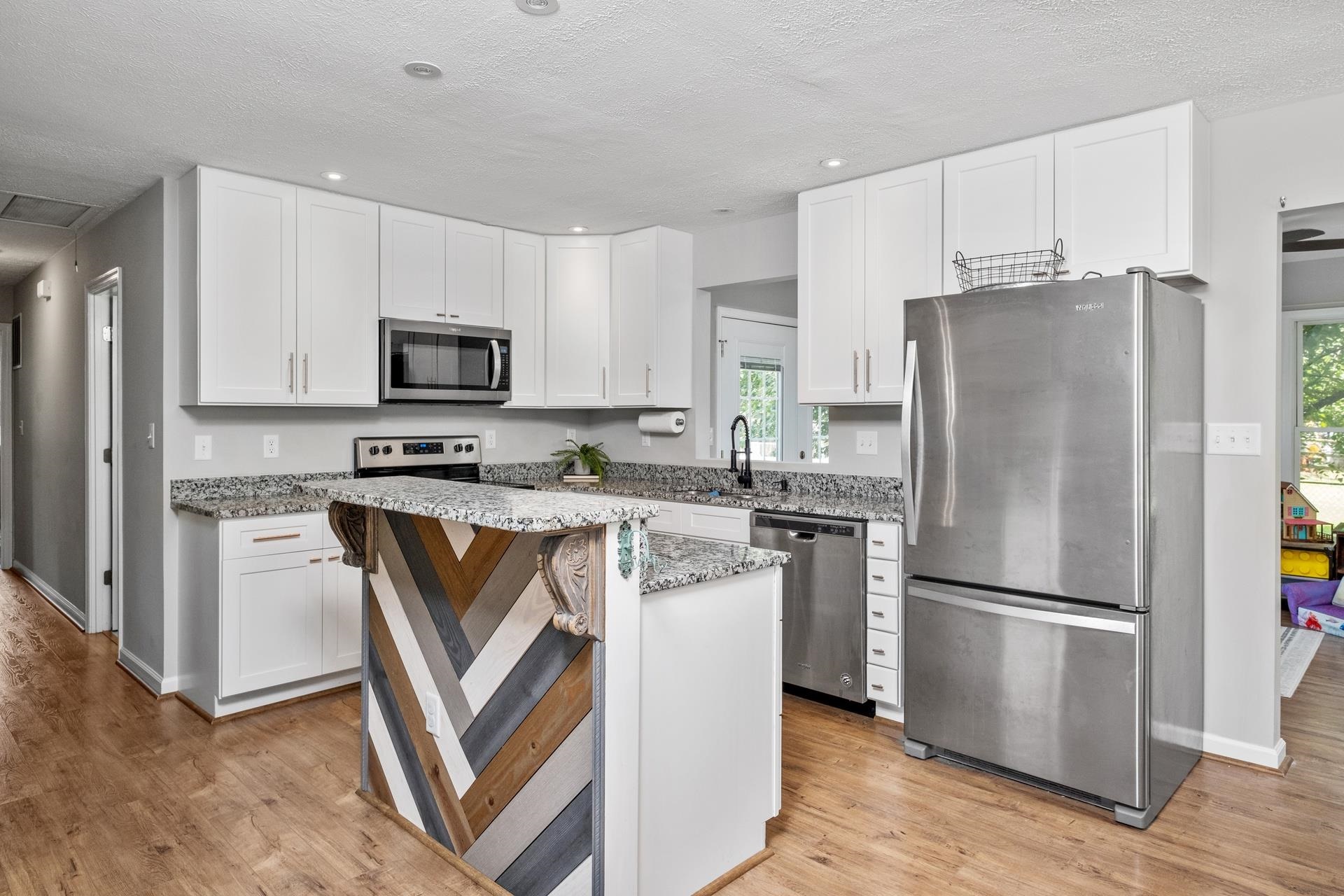 50 Valley Road Ruckersville, VA 22968 - Photo 1 of 39 a kitchen with stainless steel appliances a refrigerator stove microwave and sink