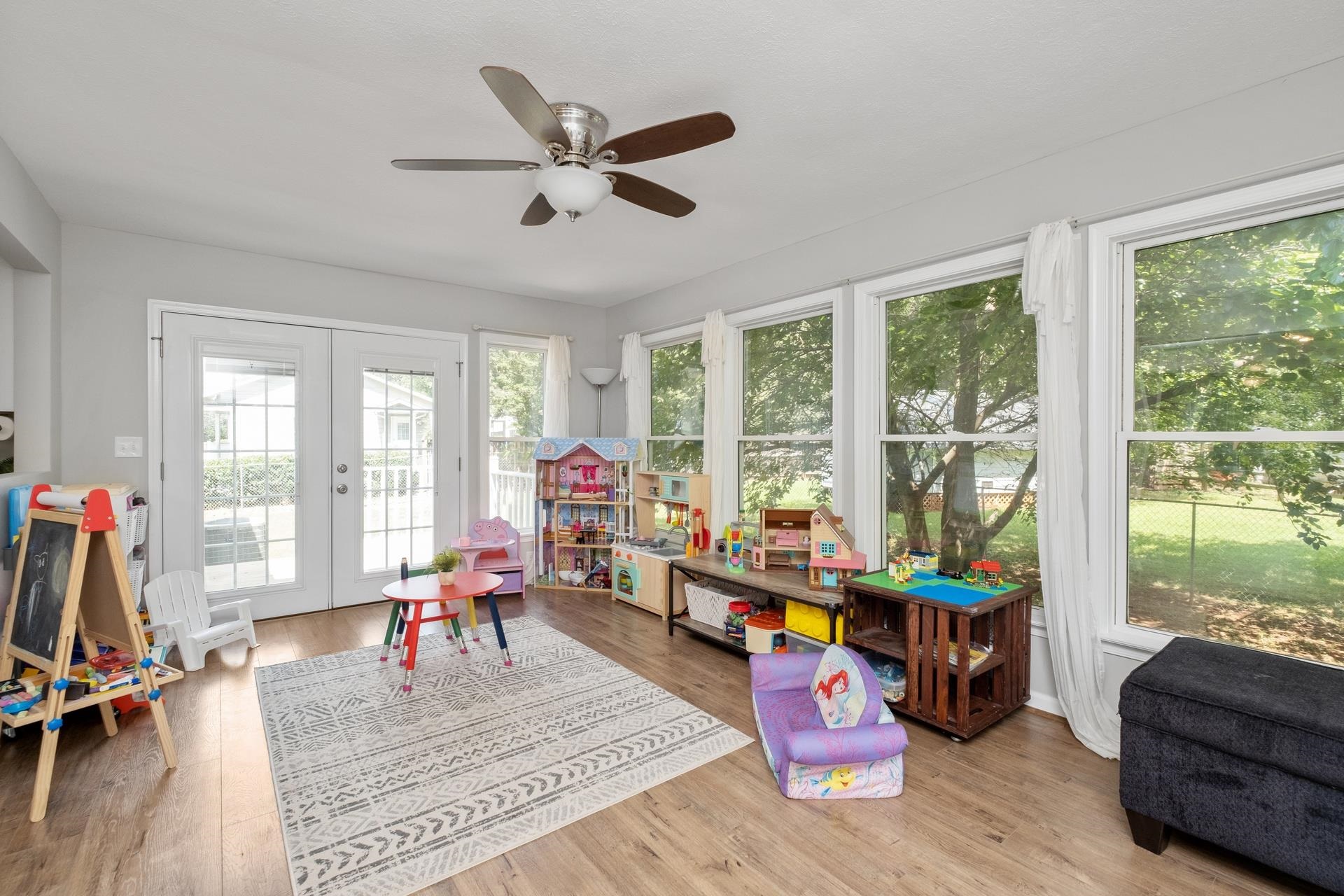 50 Valley Road Ruckersville, VA 22968 - Photo 14 of 39 a living room filled with furniture and floor to ceiling windows