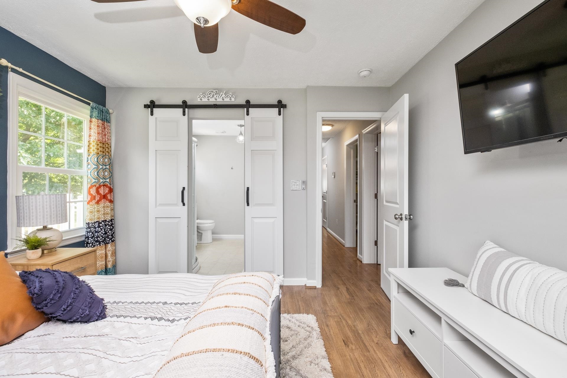 50 Valley Road Ruckersville, VA 22968 - Photo 21 of 39 a spacious bedroom with a bed and flat screen tv