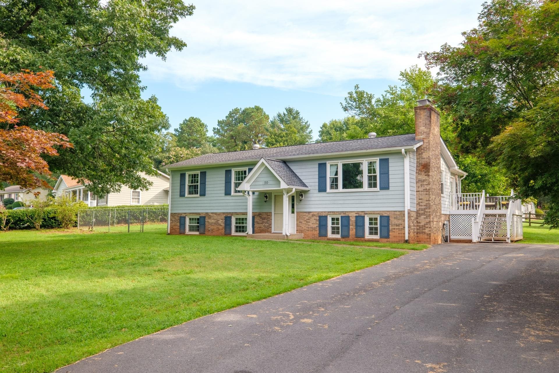 50 Valley Road Ruckersville, VA 22968 - Photo 31 of 39 a view of a house with a big yard and large trees