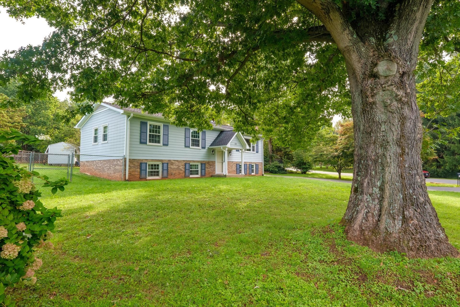 50 Valley Road Ruckersville, VA 22968 - Photo 34 of 39 a front view of house with yard and green space